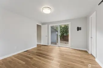Light and bright master bedroom with deck access.
