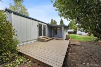 Adjacent large deck with back door and master bedroom access.