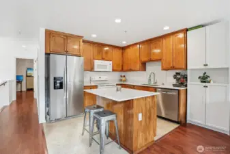 Updated kitchen with terrific storage, granite counters and SS appliances