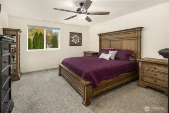 Primary bedroom with east facing windows & mountain views.