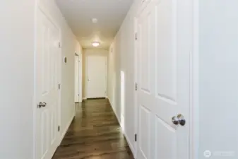 Front entry Hallway/ Garage Entrance-powder room- den