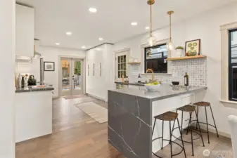 Very spacious kitchen with tons of cabinets.  French Doors leading out to the backyard.