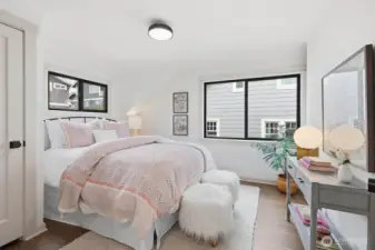 Second bedroom on the upper level.  Just a half flight of stairs down the 2nd bathroom.