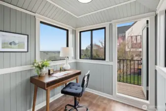 Crows nest office with view balcony.  Top the hill perch at 2512 Nob Hill Ave N capturing the best views. This is a half flight of stairs up from the Primary Suite.  The Seller added a 2nd laundry room for stackable W/D to supplement the lower level full size laundry room.