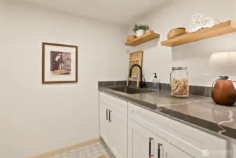 Lower Level laundry room - full size side by side W/D hookups on the left side (not shown in this photo).