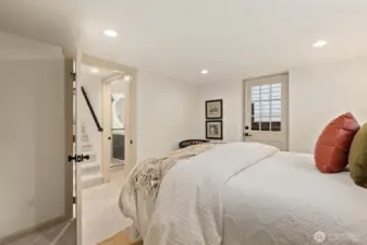 Lower Level bedroom with exterior access to backyard/sideyard.