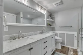 Upgraded Primary Bath with quartz countertops, updated vanity too and don't forget the bidet