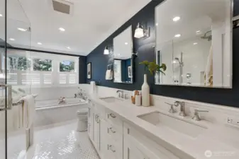 Every day is a spa day in this show-stopping bathroom! Dual sinks with Hansgrohe faucets and tons of storage below.