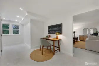 The studs-out remodel down here means all new or nearly new plumbing, wiring, insulation, carpet, trim, paint and more. This nook is a great homework spot, project space, gear storage area, or....?