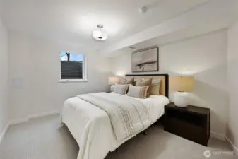 The fourth bedroom with permitted egress window (south-facing for great natural light) is a perfect home office, guest or teen bedroom with the bathroom just across the hallway.