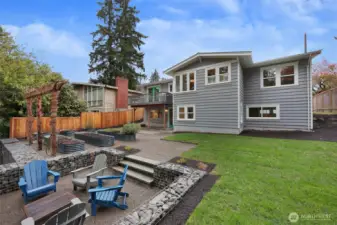 The next owner will enjoy the fruits of SO much labor, which transformed this back yard into an incredible space!