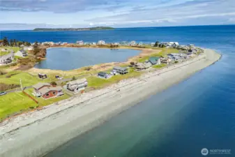 Diamond Point is truly glorious. Protection Island is in the background  - separating the Straits of Juan de Fuca and Discovery Bay. The house is in the foreground - right on the beach.