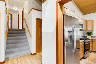 Stairs to bedrooms and laundry and half bath to the right