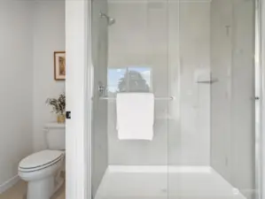 Primary Bathroom and easy in walk-in shower.  (Photo is from Lot 2 - a mirror floorplan of this home)