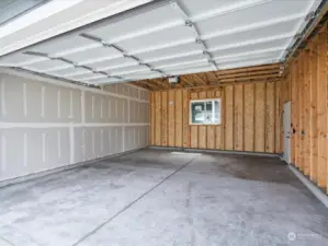 Interior of 2 Car Garage.  Wired for electrical vehicle.  (Photo is from Lot 2 - a mirror floorplan of this home)