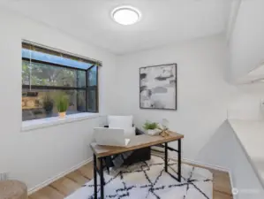 Great office or den with a garden window is open to the kitchen.