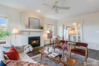 The wainscoting and window trim are unique. Note the sliding French doors to the kitchen.