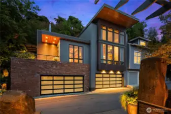 Two 2 car garages with EV chargers & DADU.