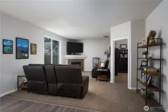 Off of the kitchen is another cozy living area.