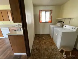 Utility room next to kitchen