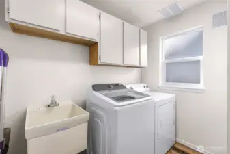 Laundry Room with utility sink and lots of additional storage