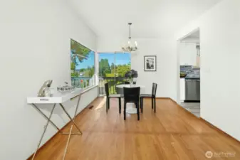 What about double French doors or sliding glass wall between the living and dining rooms?