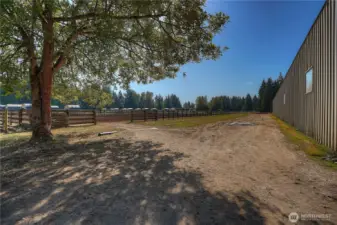 View of the track, outdoor arena & paddocks beyond.