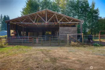 Owner's barn (formally The Sawmill) with four - 12X12 run-in stalls, feed storage and paddocks / pasture area