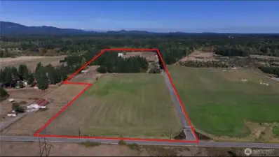 View of the entire property from 113th Ave SW looking to the north - The red border is approximate boundary lines.