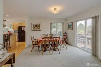 Ample dining space for entertaining, with access to the large deck.