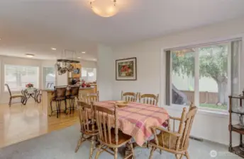 Formal Dining Room enjoys open flow into the Kitchen and Cafe' Nook.