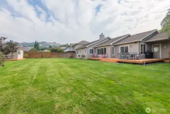 Ideal back yard for pool, soccer, or croquet parties.