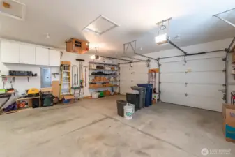 The oversized, fully-finished garage has it all! Storage, workbench, heater and air cleaner.