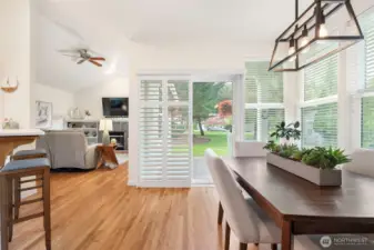 Bright dining area with a sliding door leading to the patio for easy indoor-outdoor flow.