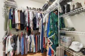 Large walk-in closet with plenty of space for storage and organization.