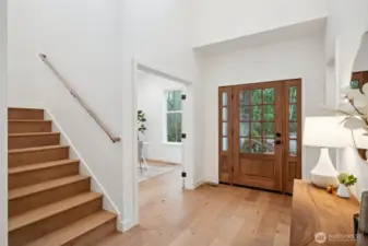 An office/den is located immediately off the front door.