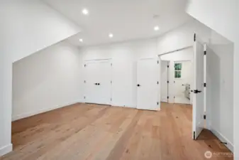 This bedroom has double french doors so could also make a great upstairs TV/rec room.