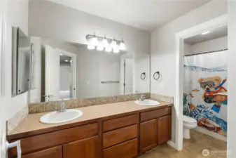 Full Bathroom 4 piece upstairs with door to seperate Tub/ Toilet from the double sinks