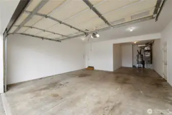 Deep 3 car tandem garage . Gas Forced air Heat with A/C Gas Hot Water as well