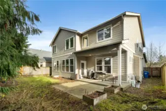 Covered Lighted Patio  area Off Kitchen/ Nook Area.