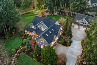 An expansive 1.4-acre playground where architecture meets nature. From the luminous 5,000 SF main residence to the detached 1,800 SF showroom and lighted sport court, every detail is designed for an elevated lifestyle.