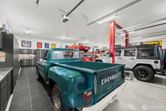 Designed for the true enthusiast, the showroom includes custom cabinetry and integrated workstations to keep every vehicle in peak condition. It is the ultimate retreat for those who appreciate mechanical art.