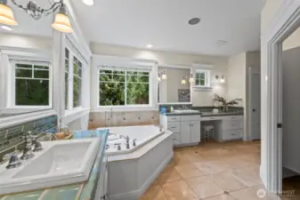 A spa-inspired ensuite featuring an oversized soaking tub, artisanal tile work, and abundant natural light. Designed for rejuvenation, this space balances Hamptons-style crispness with high-end comfort.