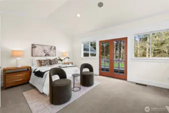 Spacious yet cozy, the primary retreat has it's own balcony