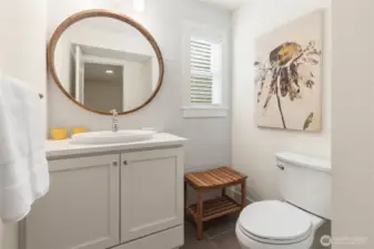 Light & airy powder room.