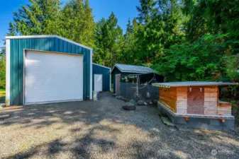 Huge garage with additional outbuildings - plus chicken coop!