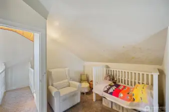 Primary bedroom nook provides ample extra space.
