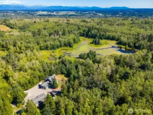 There are four parcels making about 70 acres and the potential to build another residence or two and possibly 4 detached ADU's.