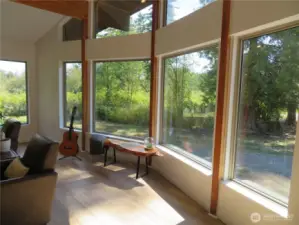 Front living rooms windows add architecturally modern ambience.