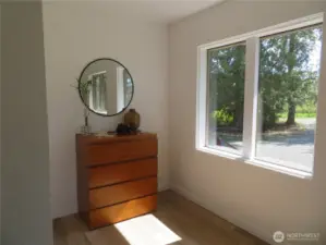 There is a little side space to the primary bedroom that is unique and could accommodate a little sitting area, small office, or even a crib for a temporary newborn access.